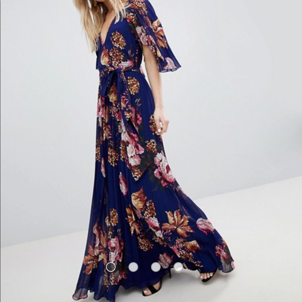 Navy maxi dress with floral pattern.